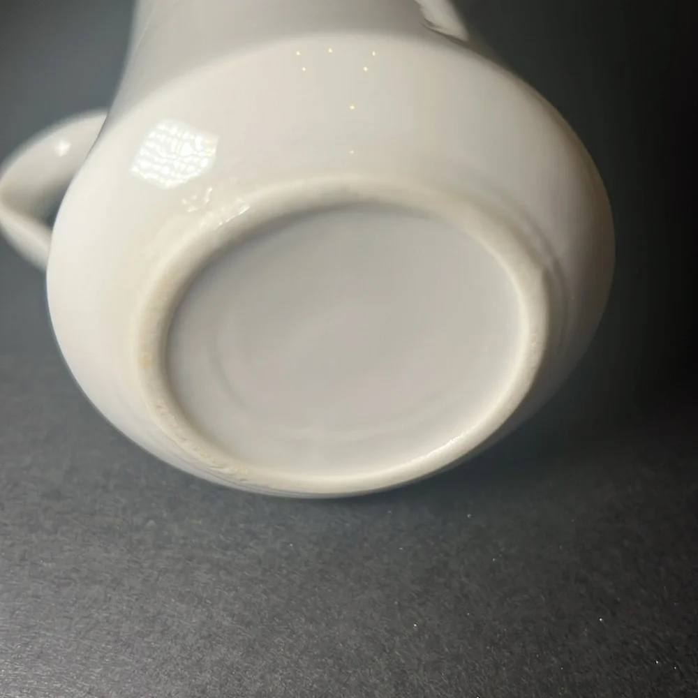 Vintage white porcelain cream‎ and sugar with floral design